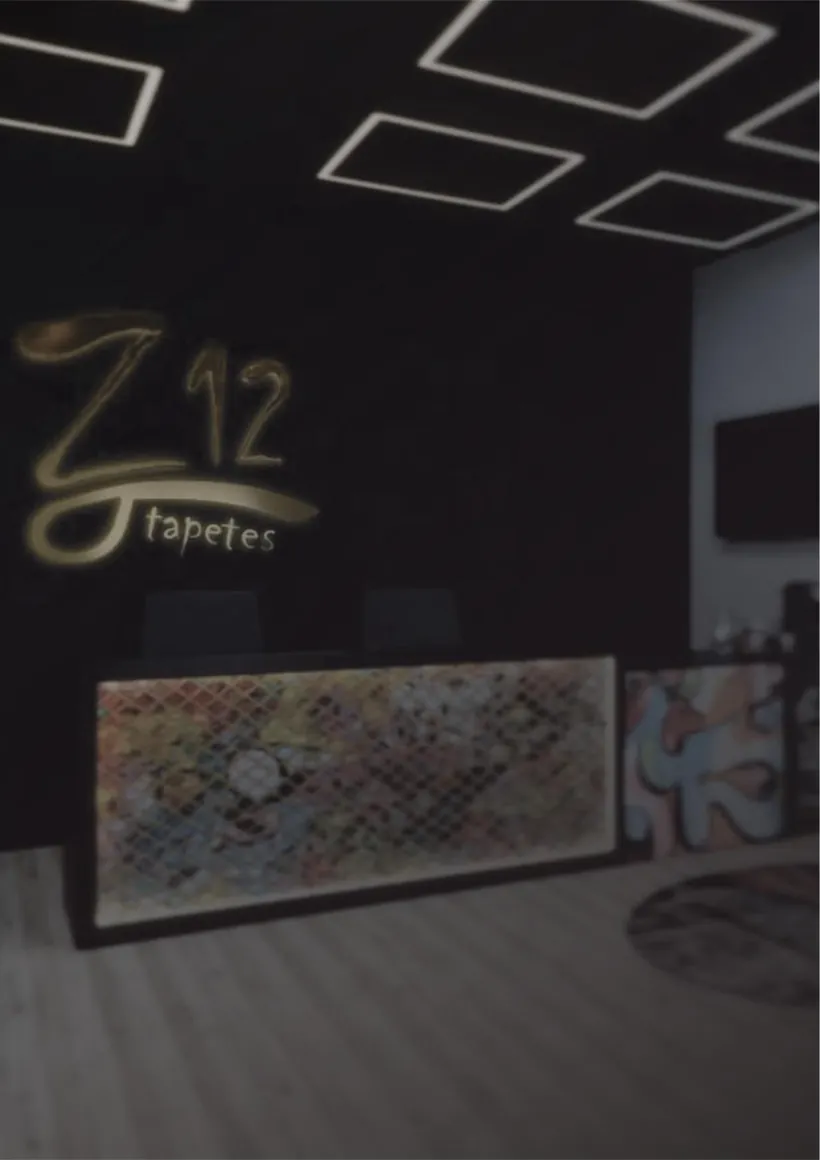Recepção da Z12 Tapetes, com a logo dourada na parede e o balcão personalizado.